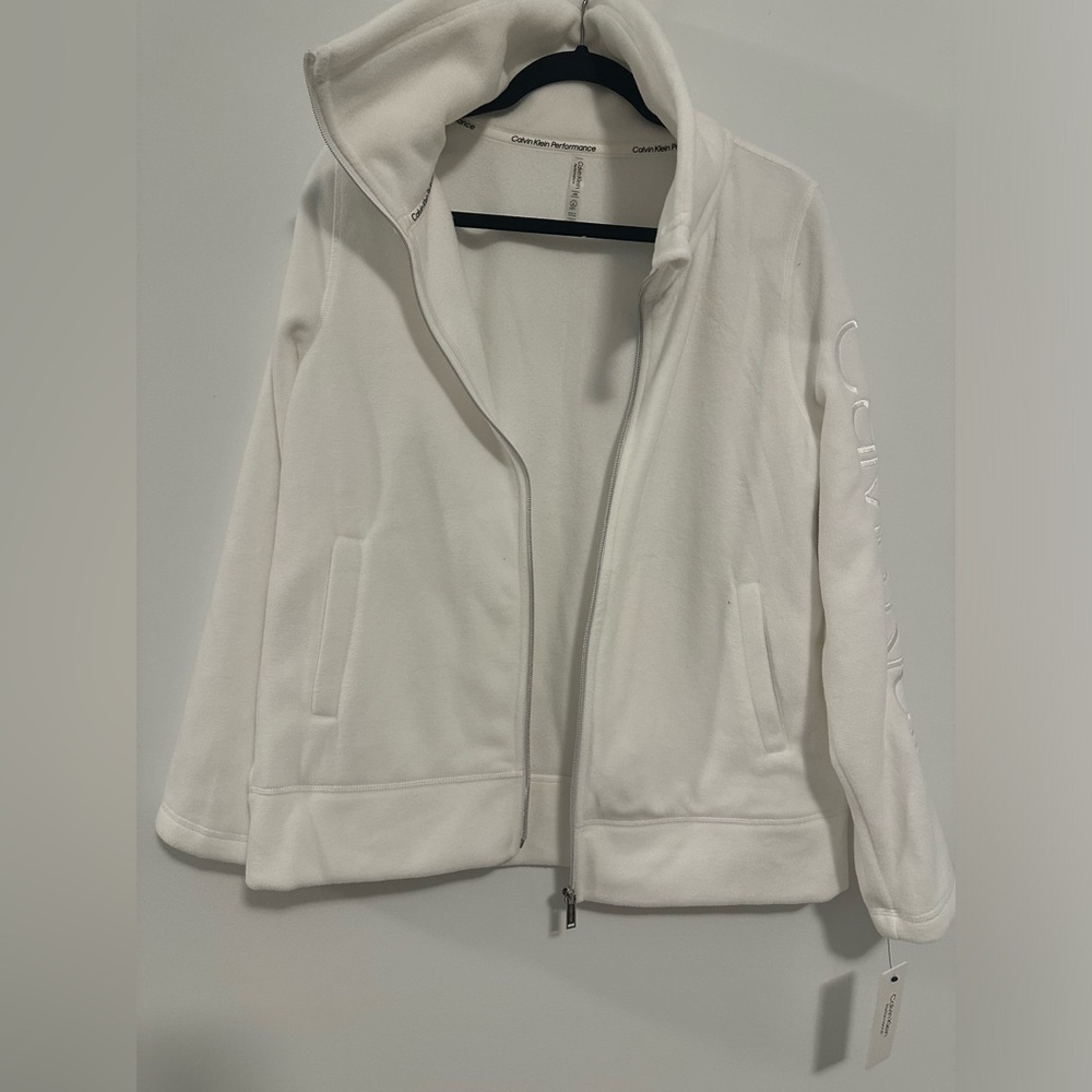 Calvin Klein fleeced jacket. Size Large. New with tags.